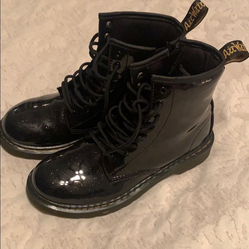 Girls like brand new Dr. Martens, black sparkles